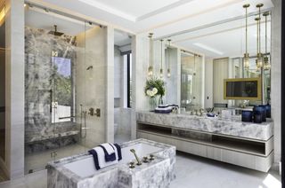 A luxury white and grey marble spa bathroom