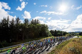 Cyclists ride during the 198,5 km second stage of the Arctic Race of Norway between Mo i Rana and Sandnessjoen