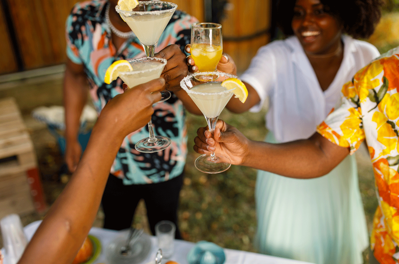 People drinking Margarita cocktails at a party