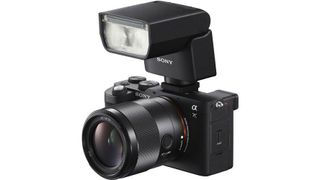 Sony HVL-F28RM flash on a Sony A7C mirrorless camera