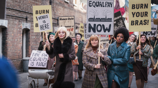 Nurses Trixie Aylward (played by Helen George), Rosalind Clifford (Natalie Quarry) and Joyce Highland (Renee Bailey) lead the march for women's rights in "Call the Midwife" season 15