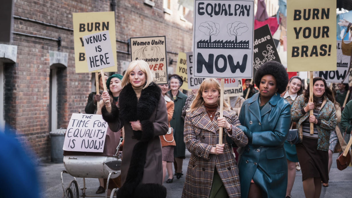 Nurses Trixie Aylward (played by Helen George), Rosalind Clifford (Natalie Quarry) and Joyce Highland (Renee Bailey) lead the march for women's rights in "Call the Midwife" season 15