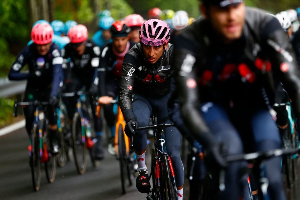 Overall leader Team Ineos rider Colombias Egan Bernal C rides in the pack during the 16th stage of the Giro dItalia 2021 cycling race 153km between Sacile and Cortina dAmpezzo on May 24 2021 Photo by Luca Bettini AFP Photo by LUCA BETTINIAFP via Getty Images