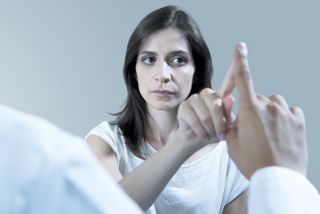 A woman does a proprioception test