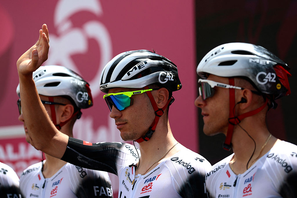 UAE Team Emirates XRG&#039;s Spanish rider Juan Ayuso waves during the presentation prior to the 3th stage of the 108th Giro d&#039;Italia cycling race 160kms from Vlore to Vlore in Albania on May 11, 2025. (Photo by Luca Bettini / AFP)