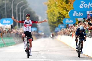 COMO ITALY OCTOBER 08 Tadej Pogacar of Slovenia and UAE Team Emirates celebrates at finish line as race winner ahead of Enric Mas Nicolau of Spain and Movistar Team during the 116th Il Lombardia 2022 a 253km one day race from Bergamo to Como iLombardia on October 08 2022 in Como Italy Photo by Tim de WaeleGetty Images