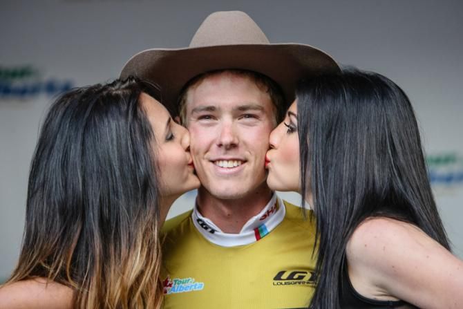 Rohan Dennis (Garmin-Sharp) gets his final podium kisses for taking the overall win.
