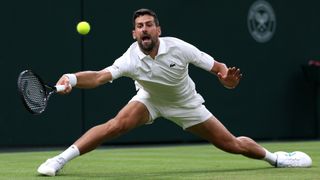 Novak Djokovic stretching for a forehand at Wimbledon 2026