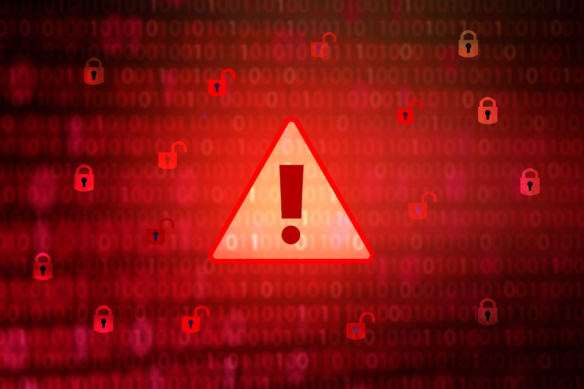 Malware stock image showing warning symbol in yellow on red background with unlocked padlocks