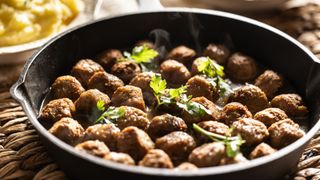 Meatballs in cooking pan