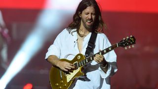 Wayne Sermon of Imagine Dragons perform at Park HaYarkon on August 29, 2023 in Tel Aviv, Israel.