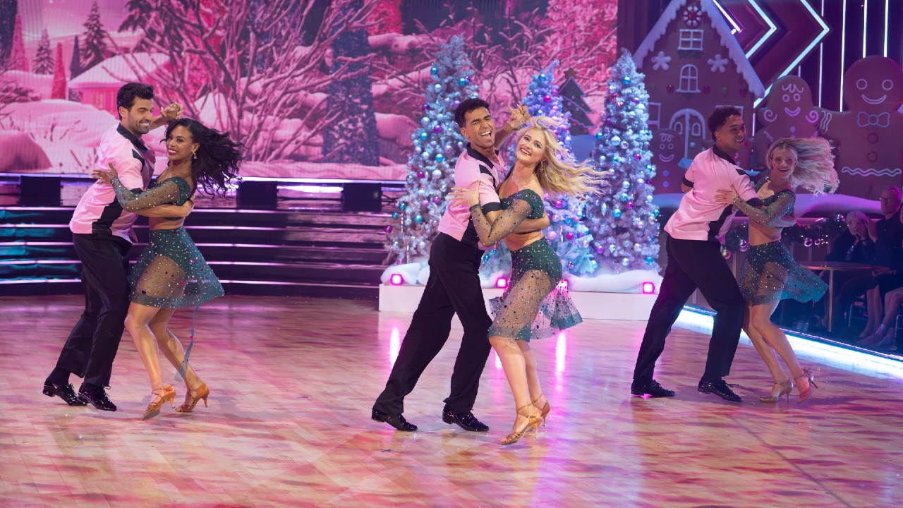 DWTS pros Jan Ravnik and Britt Stewart, Ezra Sosa and Rylee Arnold, and Brandon Armstrong and Witney Carson dancing together for Dancing With the Holidays.