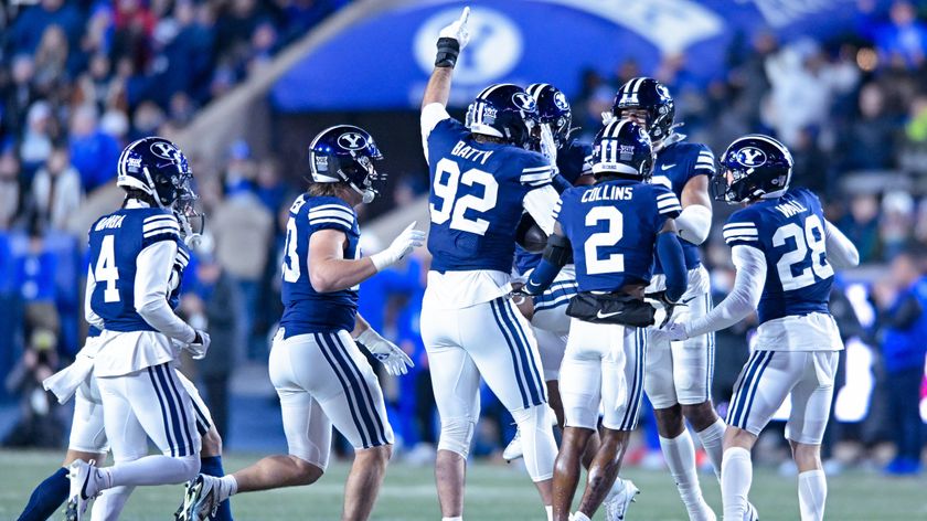 BYU Cougars players celebrate during a college football game