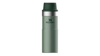 green and black Stanley Classic Trigger Action Travel Mug, one of w&h's best coffee travel mugs