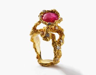 ‘Cosmos' ring in gold with diamonds and ruby