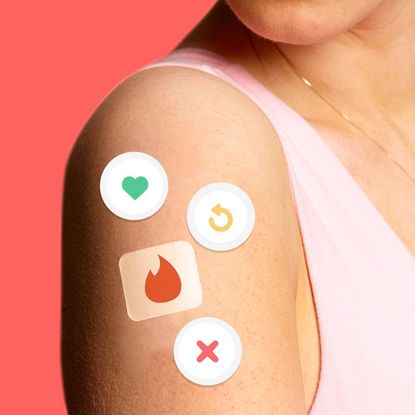 A woman wearing a stop smoking style patch displaying the Tinder logo.