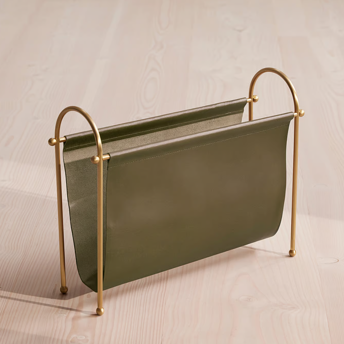 Olive leather magazine rack