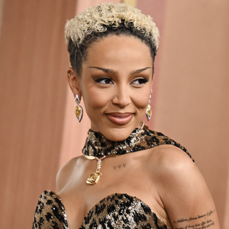 doja cat wears a leopard print strapless gown to the 2025 oscars