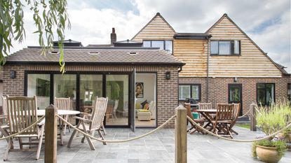 Read extension and deck on a timber clad house