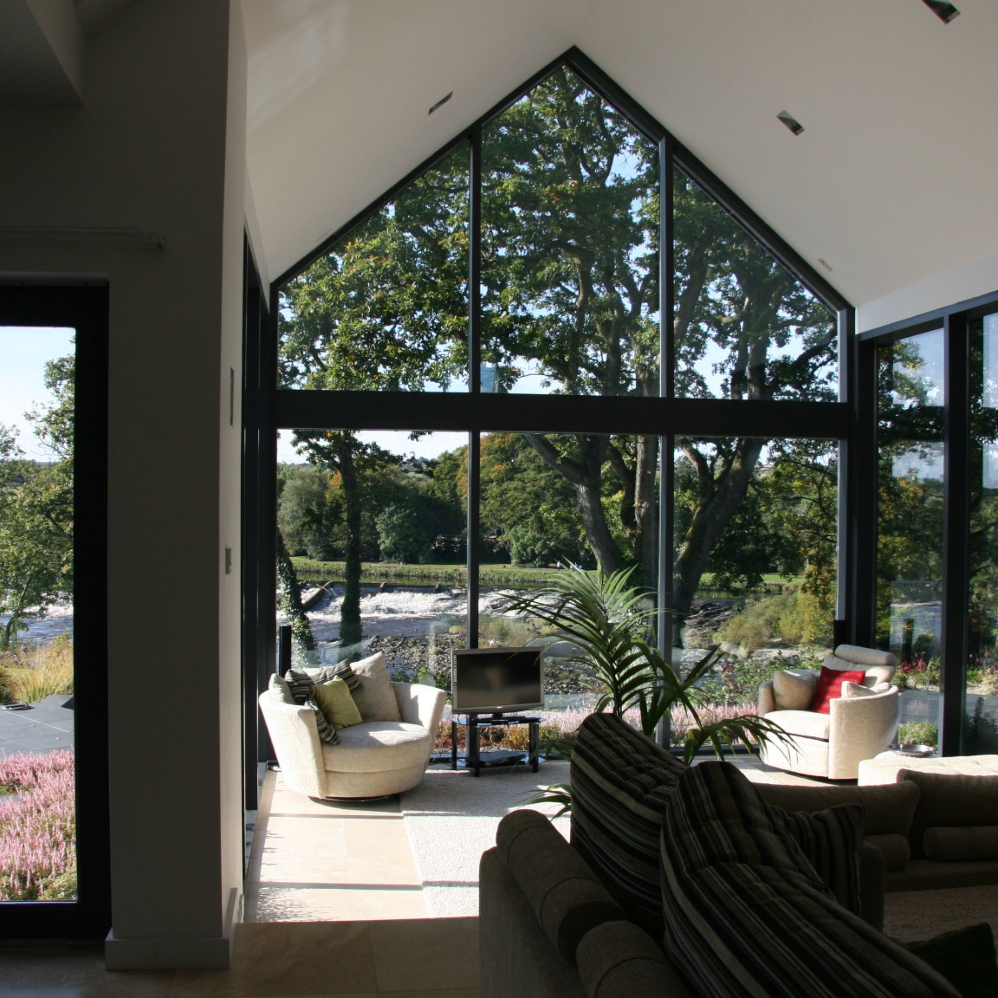 Conservatory with solid roof by Hampton Conservatories