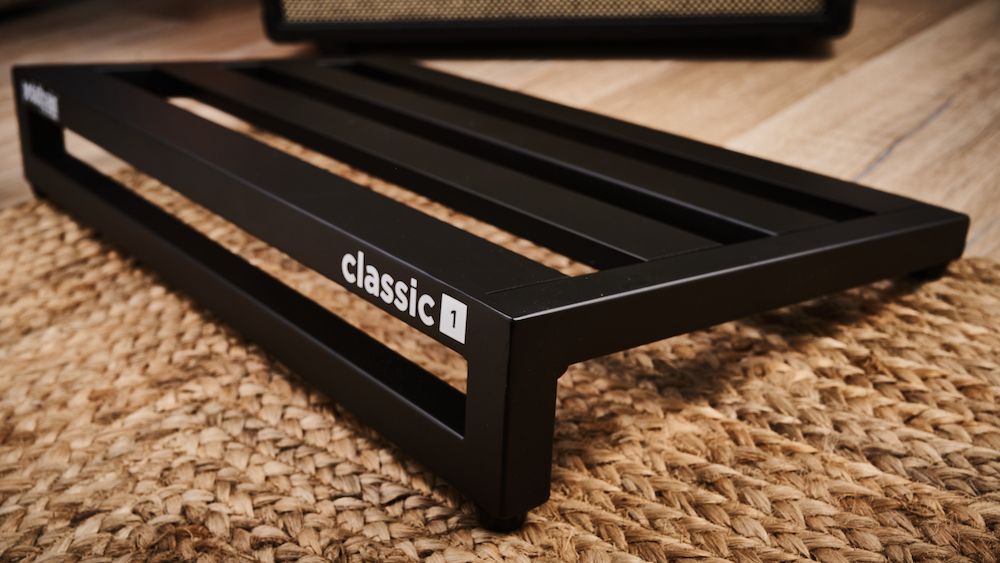 A Pedaltrain Classic 1 pedalboard on a rug