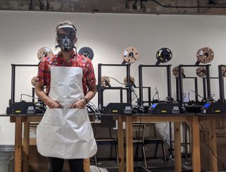 Nate Petre wearing the protective equipment at Makerversity