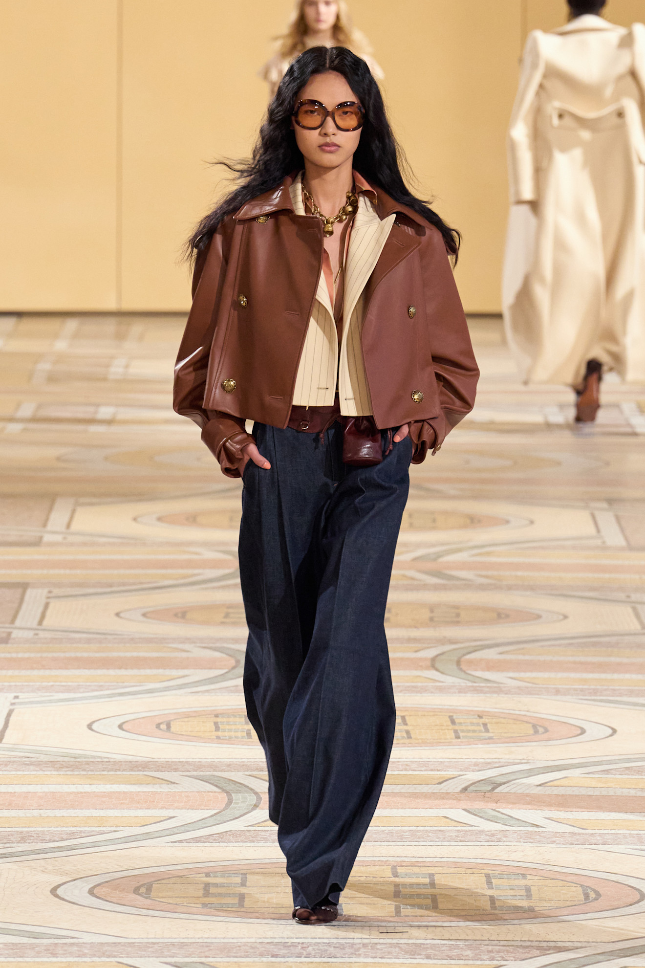 Woman in indigo jeans.