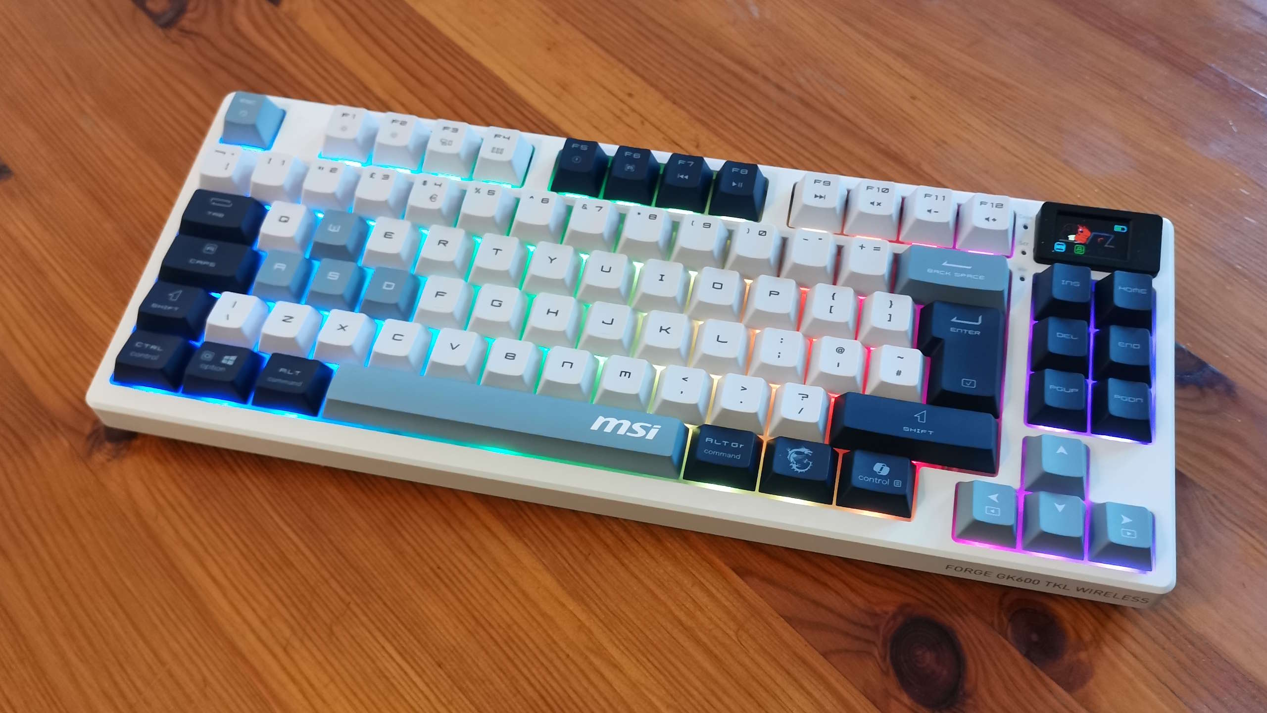 MSI Forge GK600 TKL gaming keyboard on a desk.