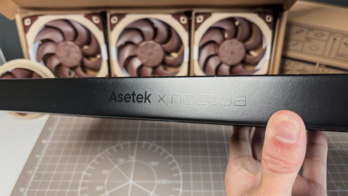 A Noctua NL-LC1 liquid cooler being installed on a test bench for testing.