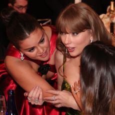 Taylor Swift and Selena Gomez attend the 81st Golden Globe Awards