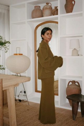 Monikh wears a green tonal outfit