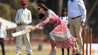 Kate Middleton playing cricket