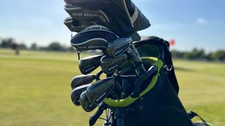 Callaway Big Bertha 2023 Irons resting in a golf bag on the course