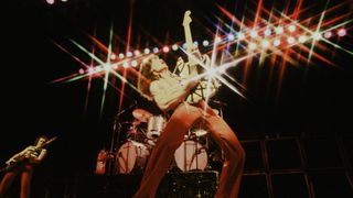 Eddie Van Halen Van Halen striking a pose at the Kouseinennkinn-kaikan, Tokyo, June 1978