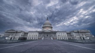 Dark image of the U.S. Capitol building.