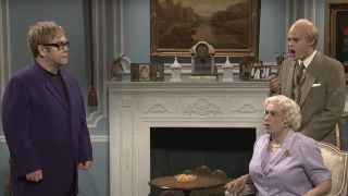 Elton John as himself with Fred Armisen as the Queen and Bill Hader as the King on SNL