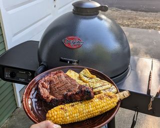 Char-Griller E16620 Akorn Kamado Charcoal Grill being tested in writer's home