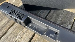 A close up of the rear of the Yamaha SR-C30A soundbar showing th ports.