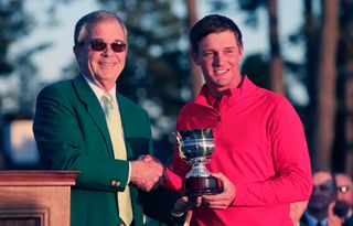 Bryson DeChambeau receives the low amateur trophy at the 2016 Masters