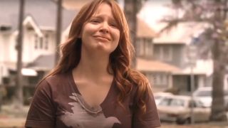 Lauren Ambrose crying in front of her house in Six Feet Under.