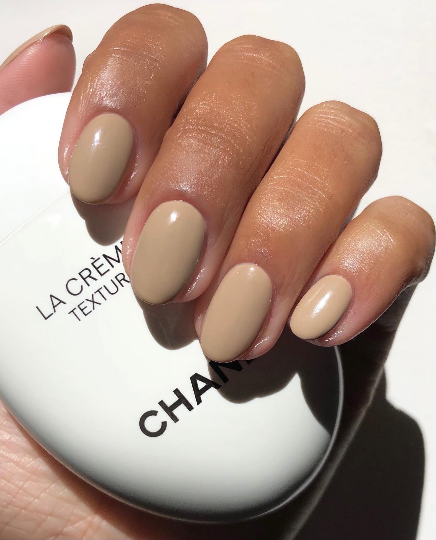 Soft beige neutral nail color.