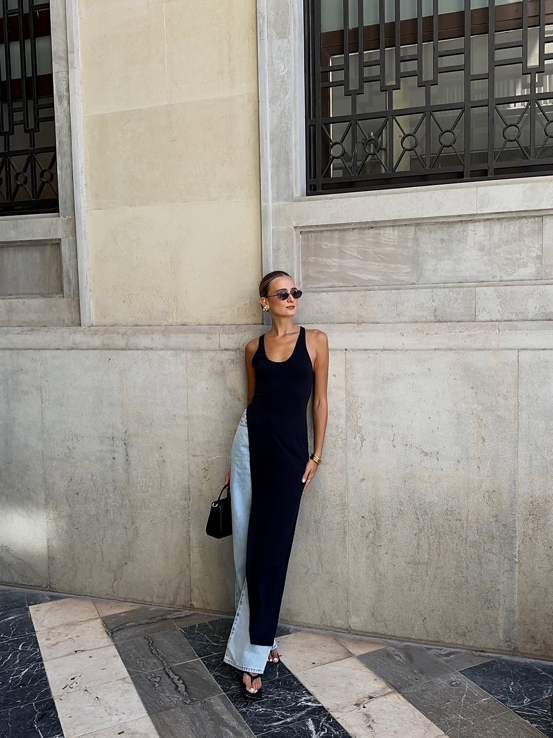 woman wearing dress over pants fall outfit 2025