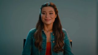 Miranda Cosgrove in a blue jean jacket and dress auditioning for The Honeypot in The Wrong Paris.