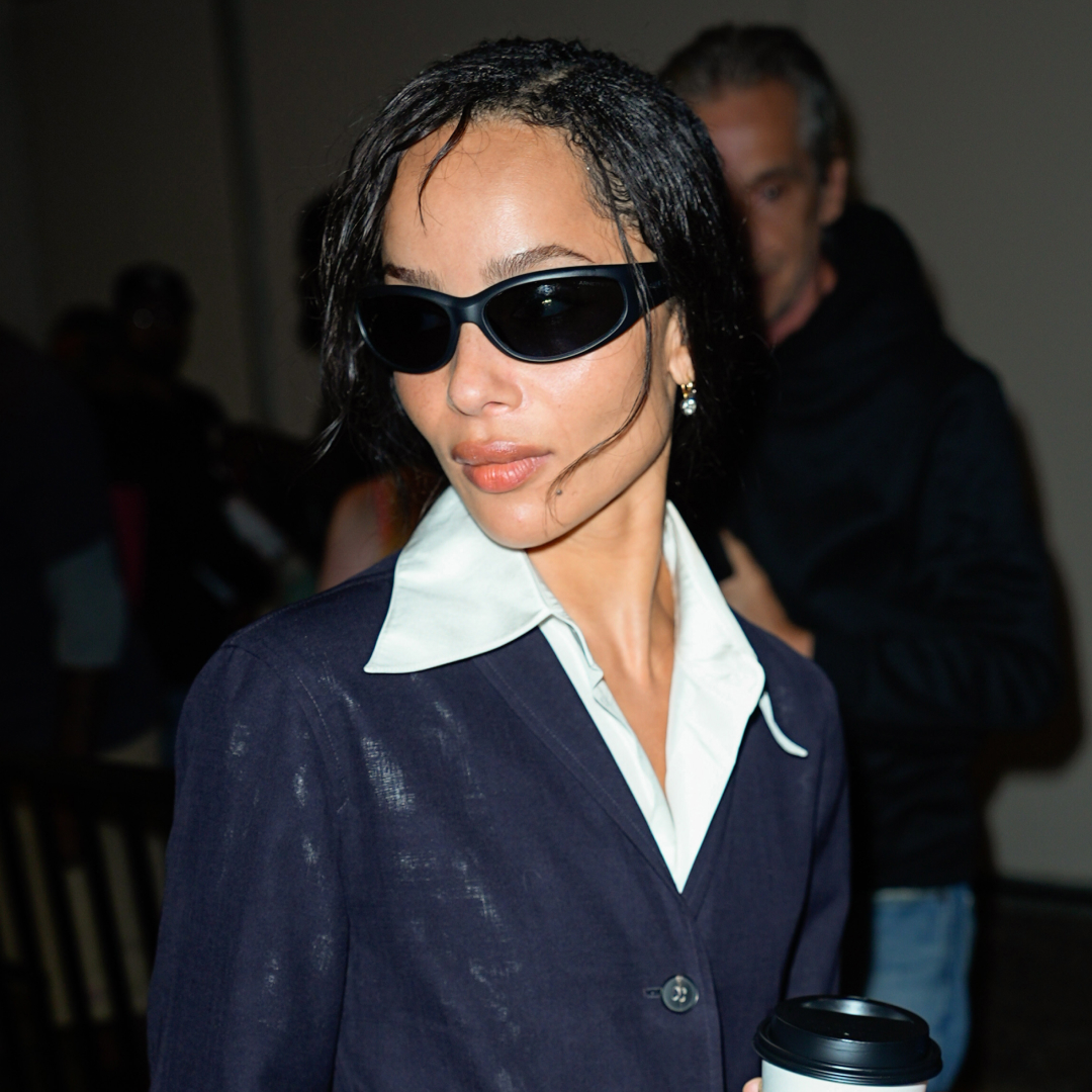 Zoë Kravitz was spotted in NYC wearing a denim chambray blue suit set and flip-flops