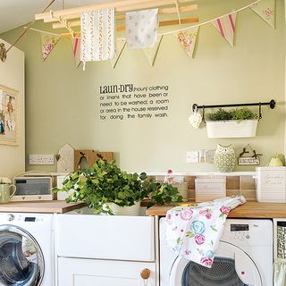 utility room with hanging napkins and potted plant