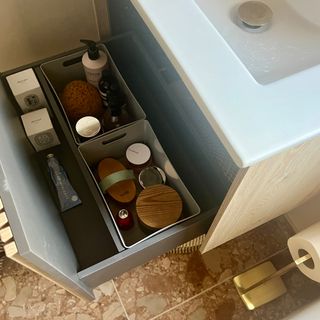 bathroom vanity with storage drawer for toiletries