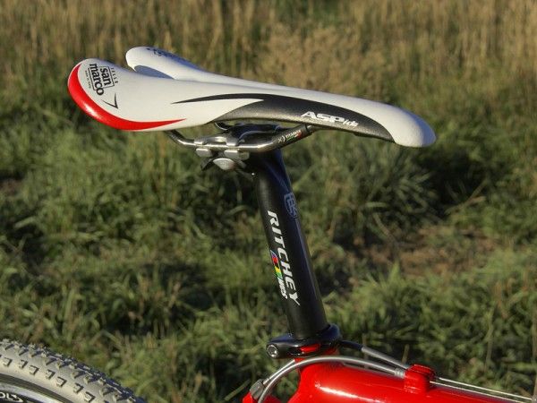 The Selle San Marco Aspide saddle and Ritchey WCS seatpost are great choices on the road but the saddle had too many sharp edges and too grippy a top for remounts. The two-bolt seatpost head also had to be torqued very tightly to prevent slipping
