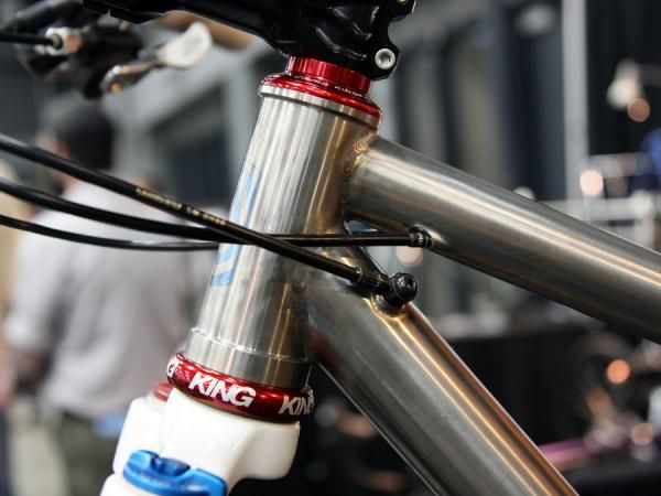The 44mm-bore head tube on this Vertigo Cycles allows for a tapered steerer tube to fit with the new Chris King headset. But wait, where's that hydraulic fitting going?