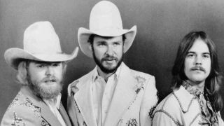 ZZ Top posing for a photograph in 1975