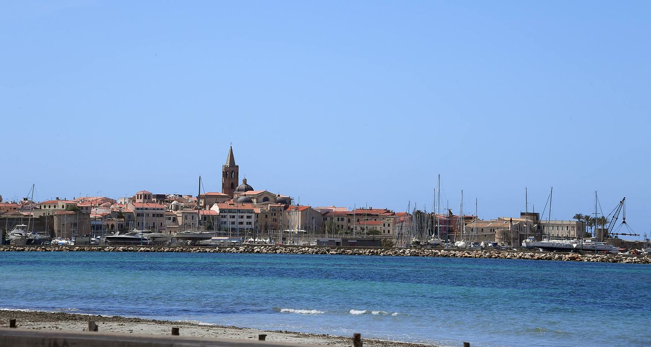 Boats line the harbour side